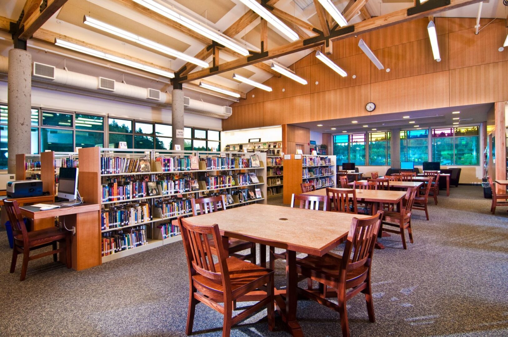 A Library Area With Stacks of Books in Shelves