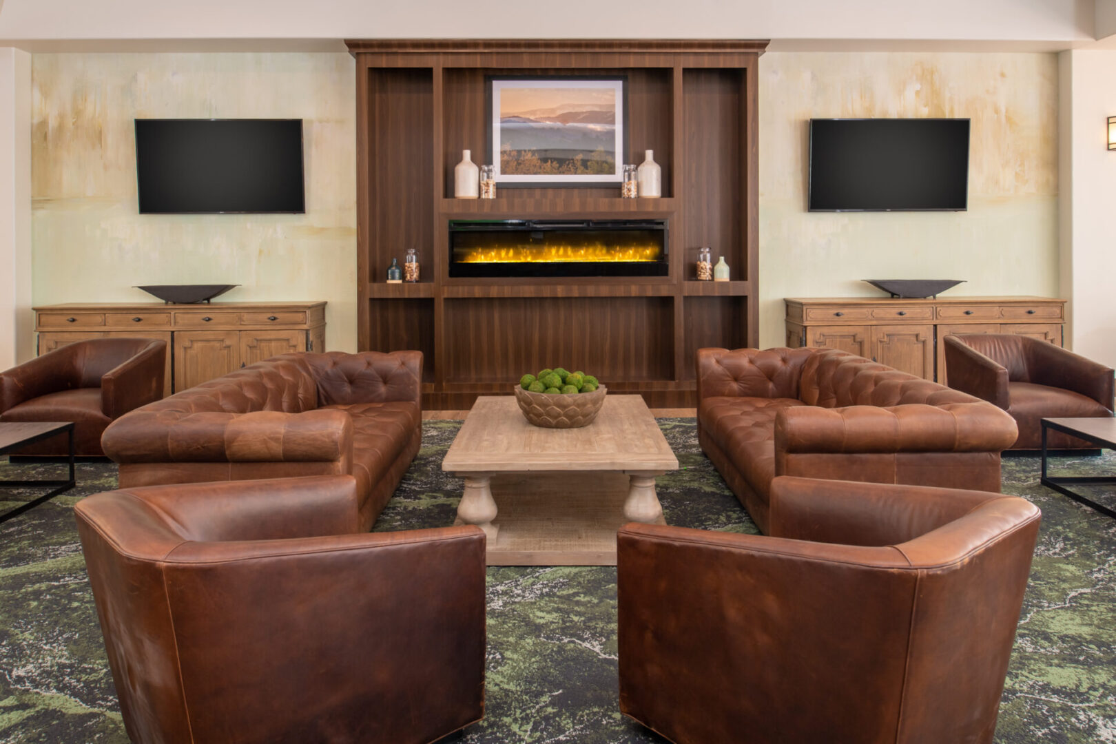 Brown Color Couches by an Indoor Fireplace